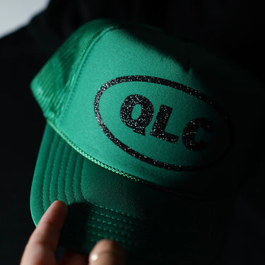 QLC Glitter Logo Foam Trucker Hat